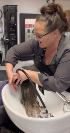 Kitti Russell working in the salon
